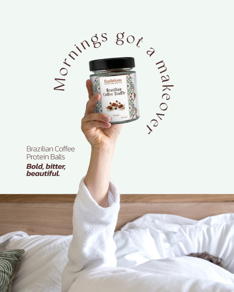 Hand in a white robe holding a jar of Rashtions Brazilian Coffee Truffle above bed linens; headline Mornings got a makeover